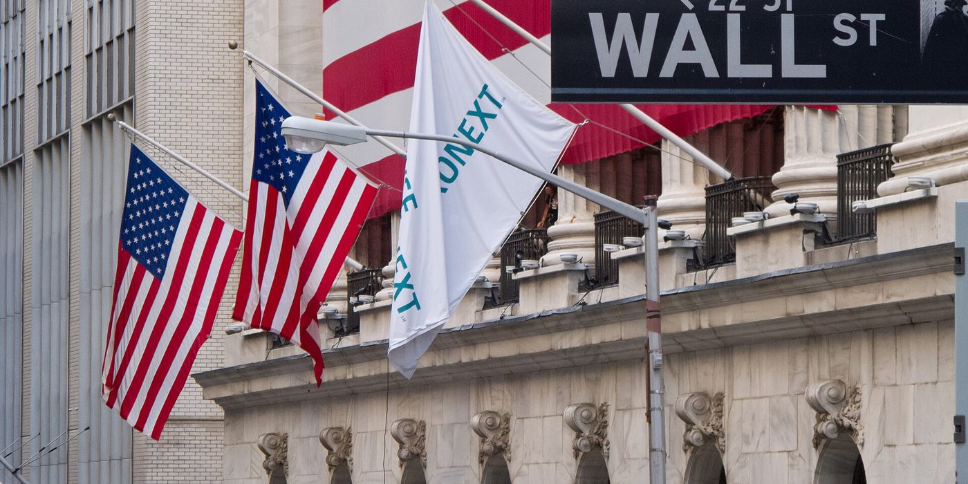 Wall Street sign in front of the New York Stock Exchange